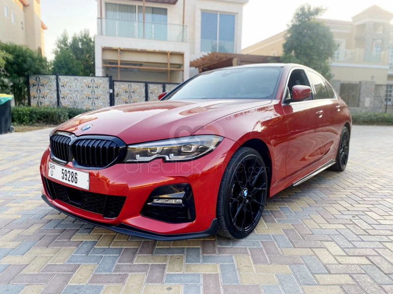 rood BMW 330i 2020 for rent in Dubai 1